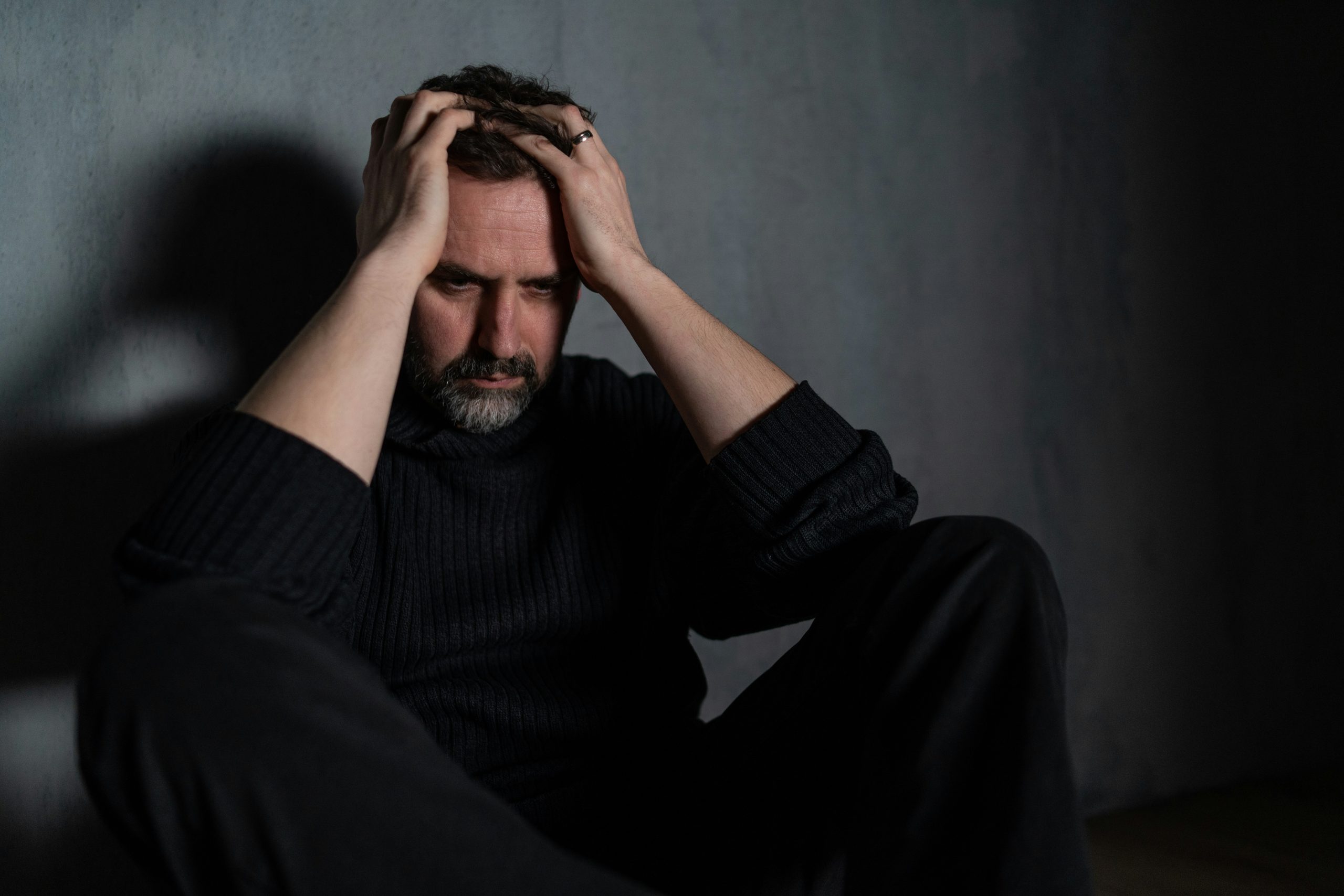 Distressed man asking himself how long does suboxone withdrawal last.